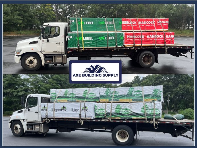 Two Axe Building Supply trucks loaded with lumber, plywood, and structural panels